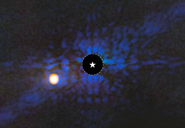 A cold super-Jupiter pictured on the outskirts of the Solar System